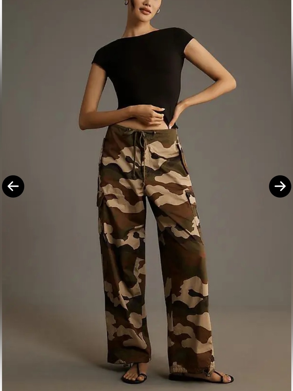 Good American Parachute Pants in the Fatigue Green Camo Colorway